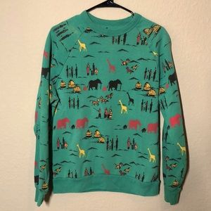 Teal color sweatshirt with African inspired print